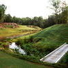 A sunny view with wooden bridge on the right at Neuse Golf Club