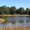 A view over the water of green at Valley Pine Country Club