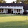 A view of the clubhouse and putting green at Chicora Country Club