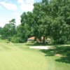 View of a green and pro shop from the Town Course at Lake Hickory Country Club