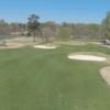 A view of a green protected by bunkers at Dr. Charles L. Sifford Golf Course from Revolution Park