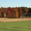 A view of a green and a fairway at Tradition Golf Club