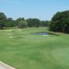 A view of a green protected by sand traps at Goldsboro Golf Course