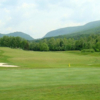 A view of a green protected by sand traps at Linville Falls Golf Club