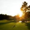 A sunny day view of a green at Southwick Country Club (McKnight Media)