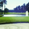 A view of a green with water coming into play from The Pines at Elizabeth City