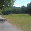 A view of a tee and a fairway at Crowders Mountain Golf Club (Golfclt)