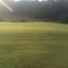 A sunny view of a green at Lake Lure Golf Course