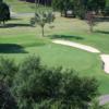 A view of a green protected by bunkers at Royster Memorial Golf Course