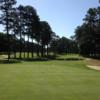 A sunny day view of a green at Chockoyotte Country Club