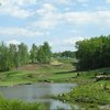 A view of the 12th and 10th greens from tee #12 at Tot Hill Farm Golf Club