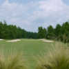 A view of green protected by bunkers at Foxfire Resort & Country Club