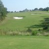 A view of the 18th hole with clubhouse in background at River Ridge Golf Club