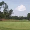 A view of hole #18 with narrow path on the right at River Course from Country Club of Whispering Pines