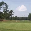 A view of hole #18 with narrow path on the right at Country Club of Whispering Pines - West Course