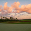 A sunset view of a green from Members Club at St. James Plantation.