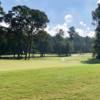 A sunny day view of hole #14 and #15 at Pine Hollow Golf Course.