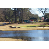 The fifth hole at Cypress Lakes Golf Course, a 179-yard par 3, opens an intriguing stretch of holes that play over and around Cypress-filled swamp.